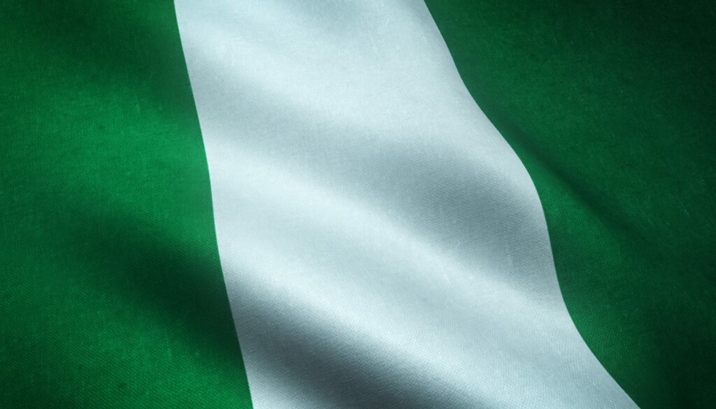 closeup shot waving flag nigeria with interesting textures scaled 1